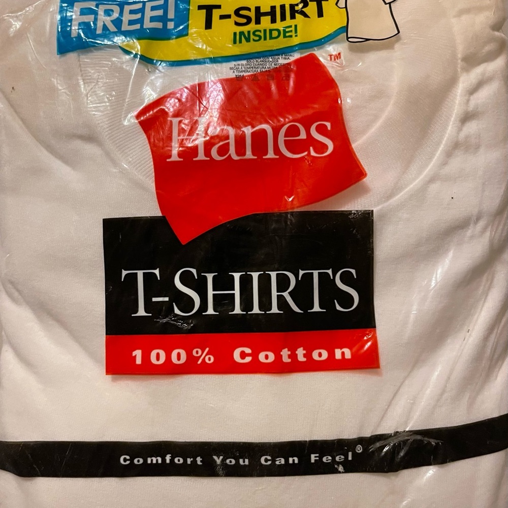 In un opened Package -Hanes white t-shirts.